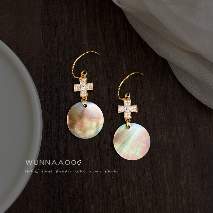 Gold Tone Clear Stone Cross And Iridescent Shell Disc Hook Earrings