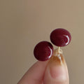 Glossy Burgundy Round Stud Earrings with Domed Profile view 6