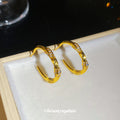 Gold Tone Textured Oval Statement Hoop Earrings Pair view 3