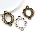 Floral Oval Cabochon Pendant Trays in Silver and Bronze view 1