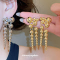 Graduated Metal Ball Fringe Statement Stud Earrings view 1