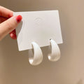 White And Mustard C Shaped Hoop Earrings With Decorative Details view 1