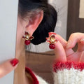 Floral Stud Earrings with Pearl Drops in Brown or Red view 2