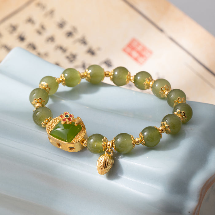Green Round Bead Bracelet Gold Tone Lotus Center Charm