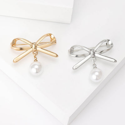 Outline Bow Pearl Drop Brooch isolated front view