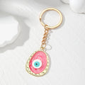 Irregular Oval Resin Evil Eye Keychains Gold Ring 6 Colors view 3