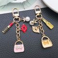 Pink White Red and Black Fashion Charm Keychains with Metal Hardware view 3