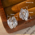 White Metal Swirl Baguette Stud Earrings Marquise Center view 5