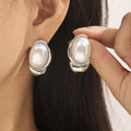 Oval Pearl Twist Frame Stud Earrings Gold Steel Metal Finish view 3