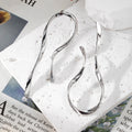 Gold and Silver Tone Long Twisted Wire Drop Earrings view 3