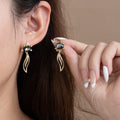 Black Faceted Top Gold Wavy Leaf Outline Dangle Earrings view 6