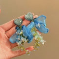 Blue Fabric Blossom Heart Earrings With Polished Metal Tone Details view 6