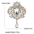 Oversized Crystal Teardrop Brooch With Polished Metal And Sculpted Decorative Details view 10