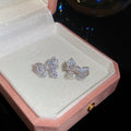 Crystal Bow Stud Earrings in Silver and Gold with Polished Metal Details view 7