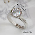 Round Clear Solitaire Bezel Ring In Polished Silver Tone view 4