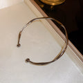 Twisted Metal Open Cuff Bracelet In Four Polished Colors view 7
