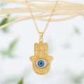 Gold Tone Hamsa Hand and Sun Blue Eye Pendant Necklaces view 2