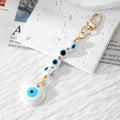 Evil Eye Bead Strand and Round Pendant Clip Keychains in Five Colors view 4
