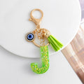 Green Glitter Letter Keychain with Evil Eye Charm and Suede Tassel view 12