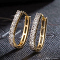 Gold Tone Double Row Rectangular Hoop Earrings With Clear Stones view 1