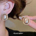 Gold Framed Oval Pearl Stud Earrings Decorative Jewelry Design view 4