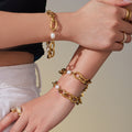 Gold Oval Link Chain Bracelet with White Shell Beads view 2
