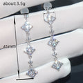 Long Diamond Shape Crystal Drop Earrings in Silver Tone view 4