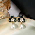 Navy and White Flower Pearl Look Teardrop Earrings view 1