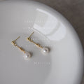 Gold Tone Fine Chain And White Pearl Like Drop Stud Earrings view 4