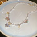Pearl Bead Necklace with Butterfly and Pastel Stone Charms view 4