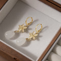 Gold Flower White Teardrop Small Huggie Dangle Earrings view 3