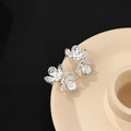 Silver Sculpted Flower Pearl Look Statement Stud Earrings view 4