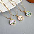 Round Floral Leaf Pendant Necklaces In Three Colors view 1