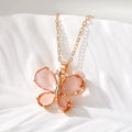 Gold Tone Faceted Crystal Butterfly Pendant Necklaces view 8