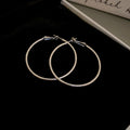 Slim Metal Round Hoop Earrings in Gold and Silver Tones view 10