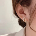 Gold Tone Layered Geometric Crystal Huggie Hoop Earrings view 3