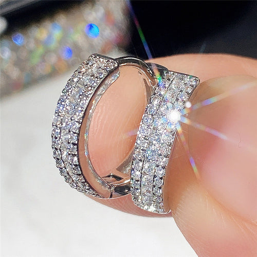 Second product view showing silver-tone triple-row pave hinged hoop earrings