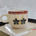 White Pink and Black Five Petal Flower Hook Earrings view 3