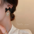 Black Bow Oval Crystal Drop Statement Earrings Pair view 2