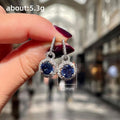 White Gold Tone Royal Blue Round Halo Crystal Drop Earrings view 4