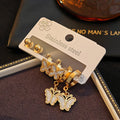 Gold Tone Three Pair Butterfly Stud and Dangle Hoop Earring Set view 3