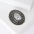 Braided Oval Crystal Brooch With White Pearl Accent view 2