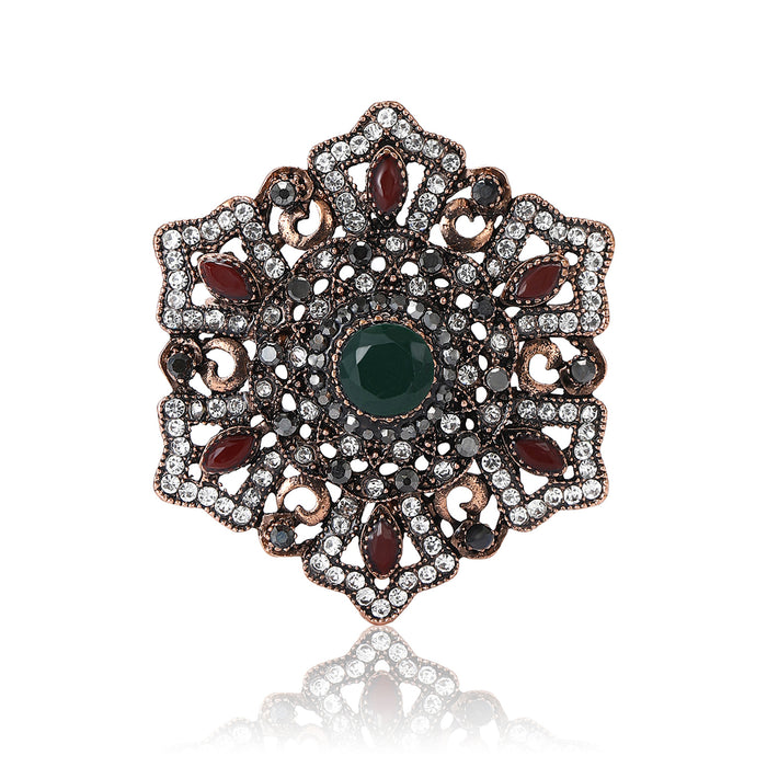 Ornate Floral Medallion Brooch with Deep Green Center