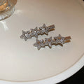 Silver Tone Crystal Hair Clips In Star Cluster Or Bow Shapes view 6