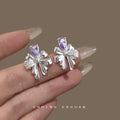 Silver Bow Stud Earrings Purple Teardrop Clear Accents view 1