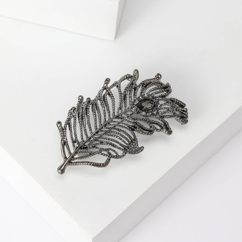 Textured Feather brooch shown in angled product view