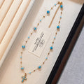 Blue Bead Cross Pendant Necklace with Gold Tone Chain view 2
