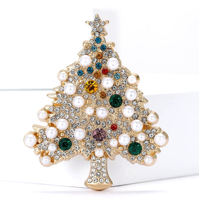 Front view of a gold-tone Christmas tree densely set with colorful stones and pearls