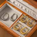 Layered Coil U Hoop Earrings in Gold and Silver Tone view 2