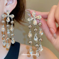 Purple Bow Crystal Waterfall Stud Earrings With Decorative Metal Accents view 3